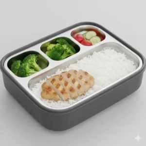 Close-up of the hygienic stainless steel interior tray in the 120W heated lunchbox UK, showing leak-proof food compartments.