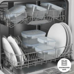 Dishwasher safe two compartment meal prep containers placed on a drying rack after cleaning.