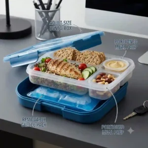 A sleek adult-style bento lunch box with ice pack prepared for office meal prep.